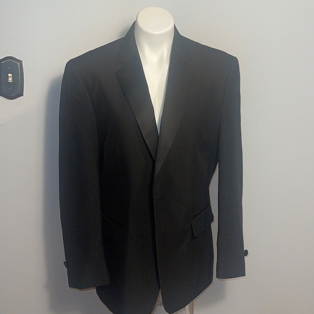 Formal Fashions men’s black tuxedo jacket and pants. Jacket 38S, Pants 34x34